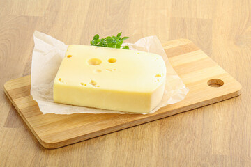 Maasdam cheese over the board