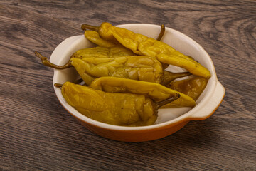 Marinated spicy and hot green pepper