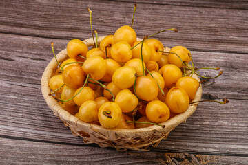 Sweet ripe yellow cherry heap
