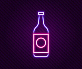 Glowing neon line Beer bottle icon isolated on black background. Colorful outline concept. Vector