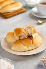 indonesian Bread with grated coconut filling plating on plate