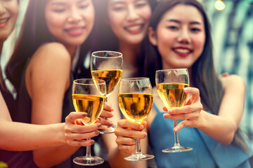 Party time start. Happy people toasting with champagne flutes. Multiethnic friends congratulating each other with new year. Celebration holiday concept, holiday background. selective focus