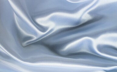 Delicate pearl white fabric with beautiful pleats. Silk, satin are folded freely. It can serve as a background for the inscription.  Pastel shades.