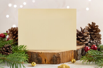 Christmas Composition with a blank card and fir branches. Holiday mockup