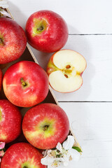 Apples fruits red apple fruit with leaves from above with copyspace copy space on a wooden board portrait format