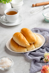 indonesian Bread with grated coconut filling plating on plate