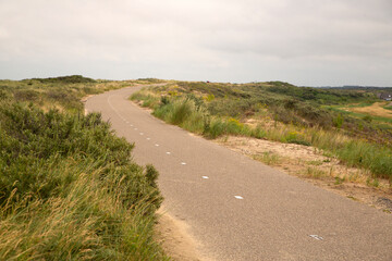 Cycling way on top of sand dunes, Ouddorp, Goeree-Overflakkee, South Holland, Netherlands