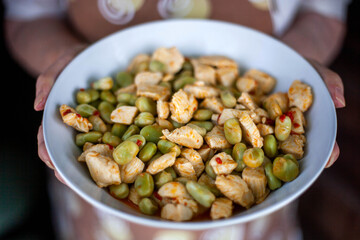 Chicken with broad beans, and a little bit of chili dough.