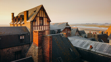 Inner streets and buildings of Mont Saint Michel, in Normandy, France, during the early morning