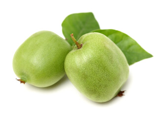 mini kiwi baby fruit (actinidia arguta) on white background 
