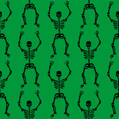 Fototapeta na wymiar pattern of skeletons on a green background