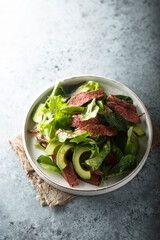 Beef steak salad with avocado