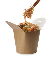 Eating seafood wok noodles with chopsticks from box isolated on white