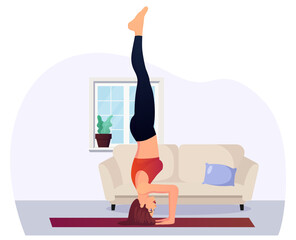 woman in handstand position performing yoga at Home for Fitness and Relaxation Premium Vector