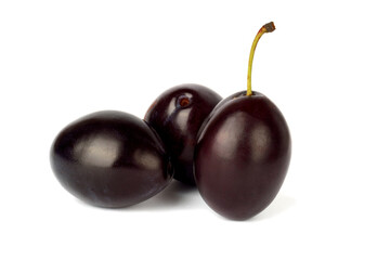 plum isolated on white background. ripe plum