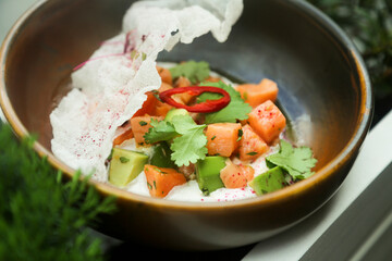 Salmon ceviche with avocado and chilli pepper