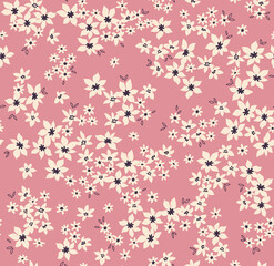 Beautiful floral pattern in small abstract flowers. Small white flowers. Pink background. Ditsy print. Floral seamless background. The elegant the template for fashion prints. Stock pattern.