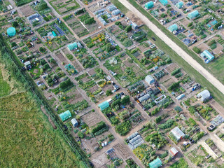 An aerial view of allotments set in a rural setting