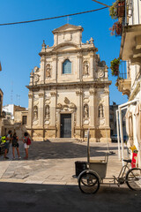 Fototapeta premium Lecce, Puglia, Italy - August 18, 2021: front view of the Baroque church of Santa Maria della Provvidenza in old town