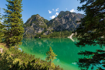 Lago di Braies or Pragser Wildsee, alpine lake and the Mountain peaks of the small and great...