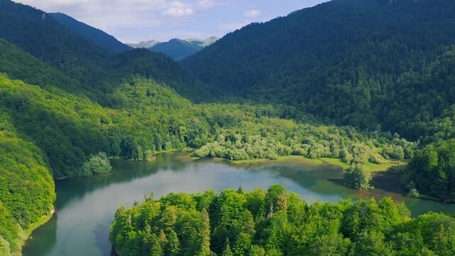 Biogradsko lake is old volcano lake in Kolasin, Biogradska Gora national park in Montenegro, Europe. Aerial view 4K.