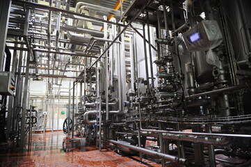 Almaty, Kazakhstan - 07.06.2016 : Pipes in the halls for fermentation and brewing of beer at the plant