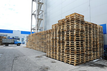 Almaty, Kazakhstan - 07.06.2016 : A stack of wooden pallets at a beer factory