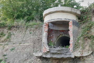 Sewage pipe collector from the city streets. Disposal of waste into the environment.