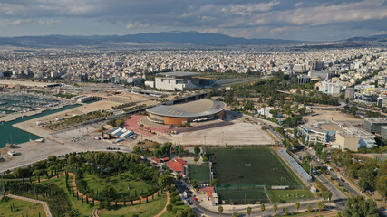 Aerial drone bird's eye view of small port and Park of Maritime Tradition where historic Averof warship is docked, Floisvos, Faliro Marina, Attica, Greece