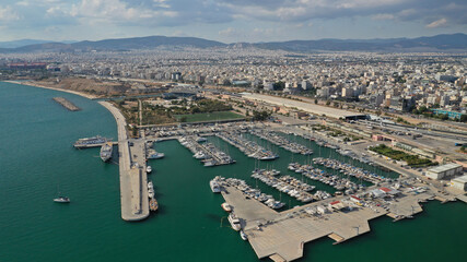 Obraz premium Aerial drone photo of famous seaside Athens riviera area of Faliro and Flisvos featuring a luxury marina for yachts and sailboats, Attica, Greece