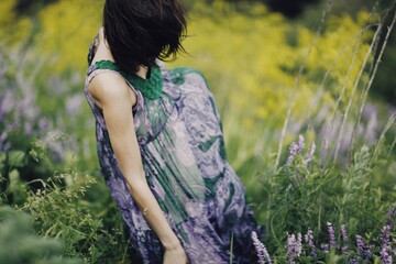 Woman in the green garden