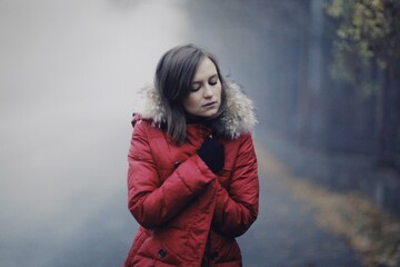 Woman walking in the winter street