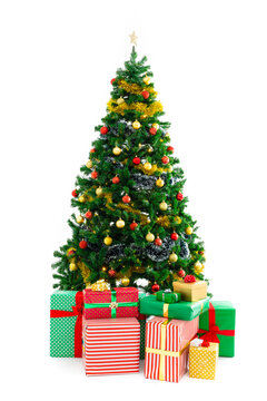 Composition of christmas tree with decorations and presents on white background