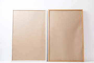 Composition of brown cards in frames with copy space on white background