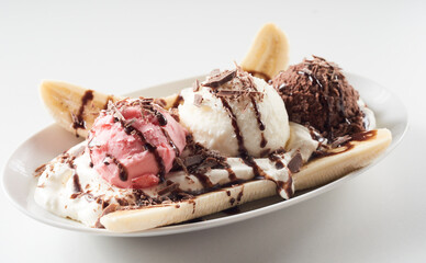 Banana split with colorful ice cream balls