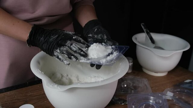 handmade bath bombs process. Preparation of bath bombs. Ingredients and floral decor on a wooden vintage table.
