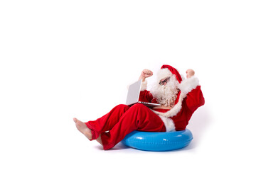 Funny santa claus with an inflatable ring.