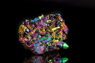 Macro mineral stone Titanium Quartz, Flame Aura Quartz on a black background