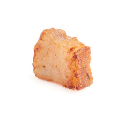Tasty fried crackling isolated on white. Cooked pork lard