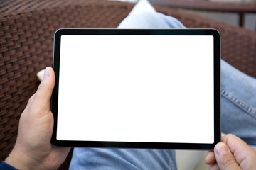 male hands holding computer tablet with isolated screen