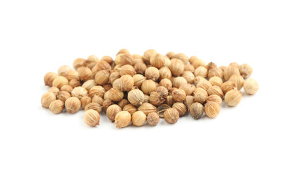 Heap of dried coriander seeds on white background