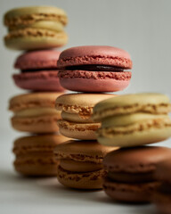 a bunch of macarons in a plate
