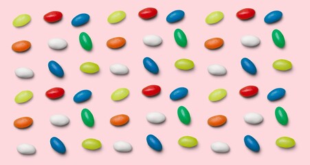 Fototapeta na wymiar Rainbow juicy gummy candies. Pattern from jelly sweets on background