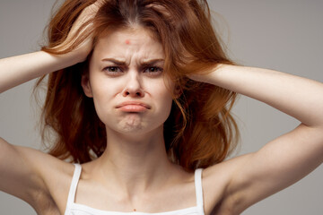 Fototapeta premium beautiful woman magnifier near the face hygiene isolated background