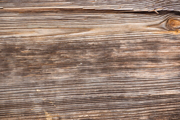 The surface of an old weathered wooden oak slab. Aged wood texture. Oak wood texture, background....