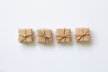 Brown gift boxes on white background. flat lay, top view, copy space