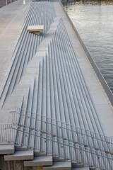 Fototapeta premium A fragment of the steps going into the water.