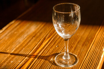 Empty glasses are on the table. A fragment of the serving.