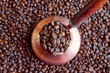 Arabica and Robusta beans are poured into the coffee maker