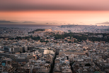 High angle view of Acropolis and Athens city in Greece at sunset from the Lycabettus Hill